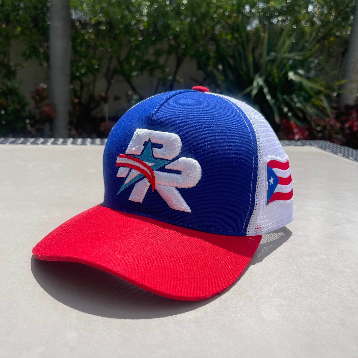 TAINOWEARS Puerto Rico Star Embroidered Trucker Hat curved brim white blue red Trucker hat
