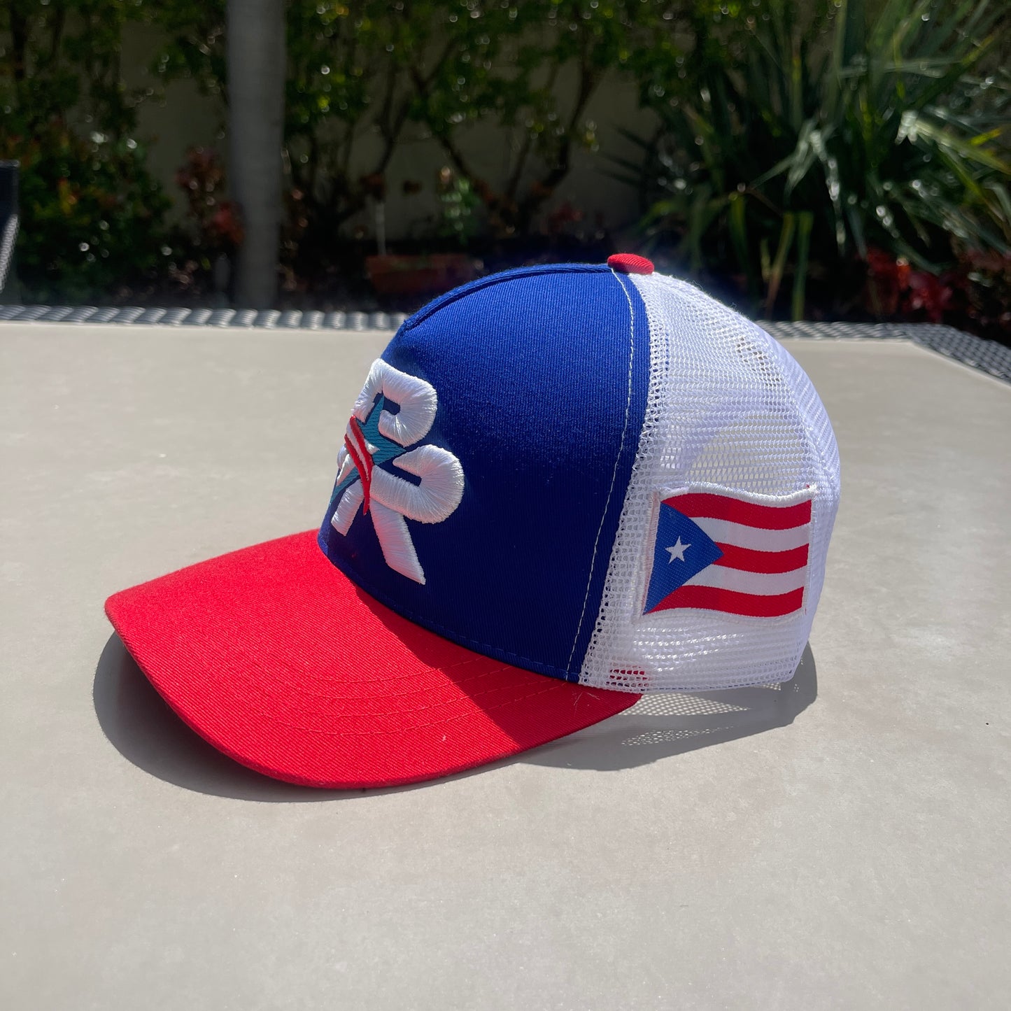 TAINOWEARS Puerto Rico Star Embroidered Trucker Hat curved brim white blue red Trucker hat