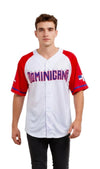 Person wearing a white and red baseball jersey with 'DOMINICANA' printed on it against a white background