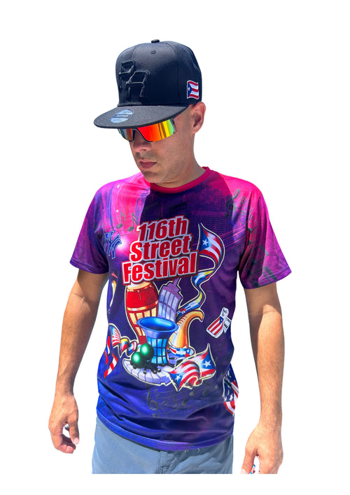 Person wearing a colorful t-shirt with '116th Street Festival' design, navy cap, and rainbow sunglasses on a white background.