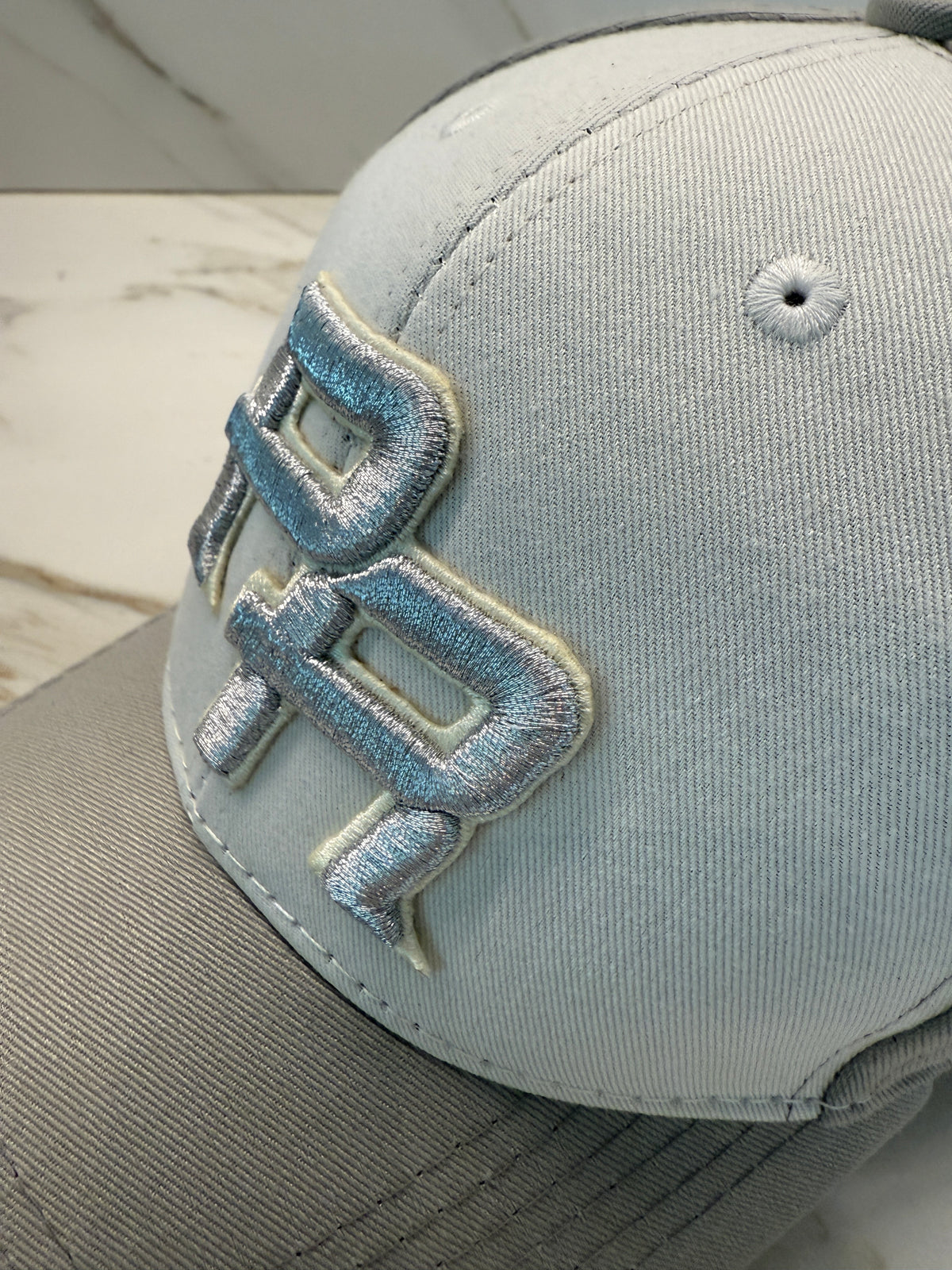 Puerto Rico PR Off-White Curved Brim Hat – Silver Embroidered Adjustable Cap