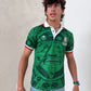 HeadzFlex green heritage polo jersey with bold graphic design