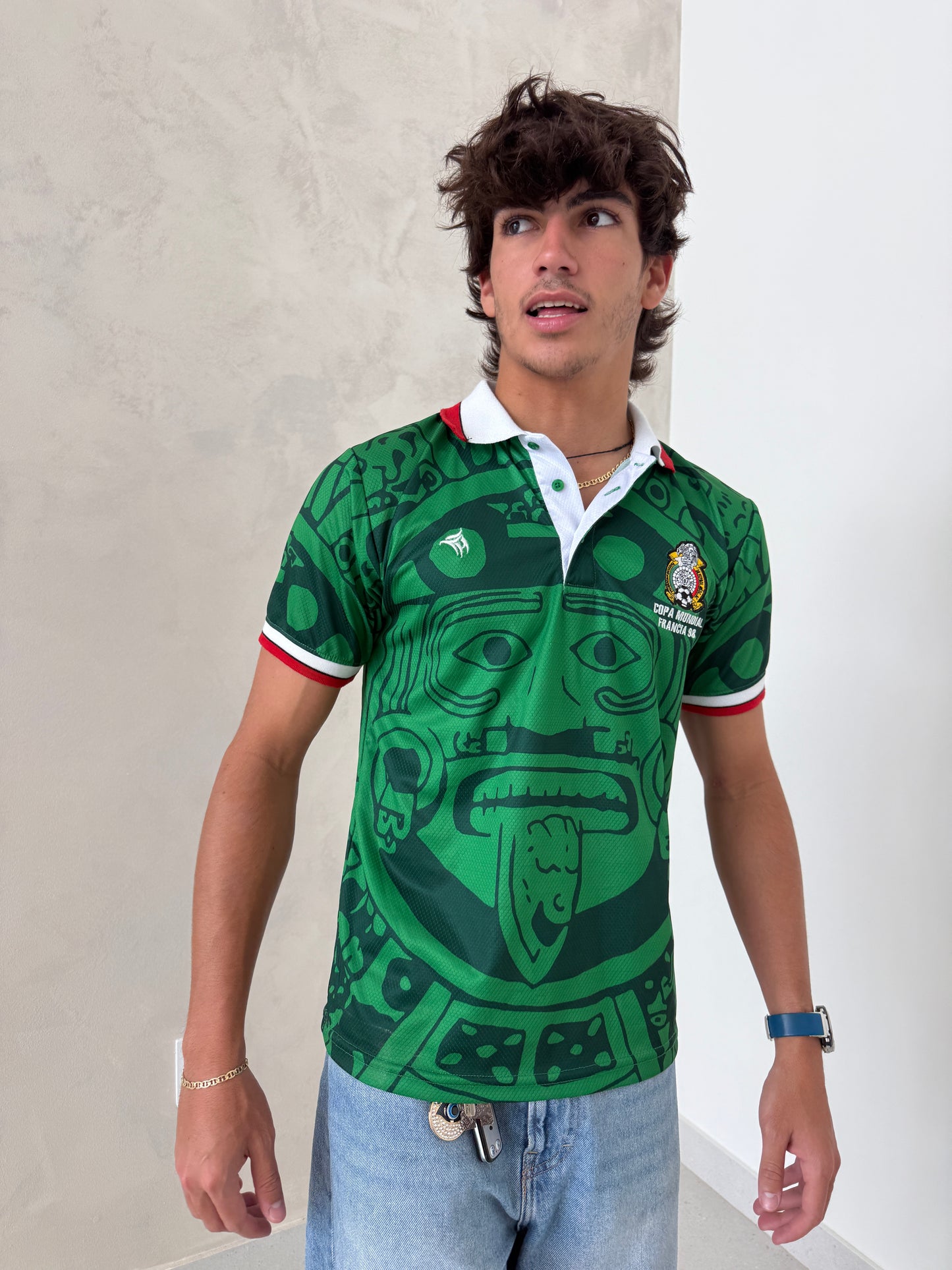 HeadzFlex green heritage polo jersey with bold graphic design