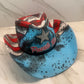 Closeup of Boricua Vaquera PR cowboy hat with distressed island artwork