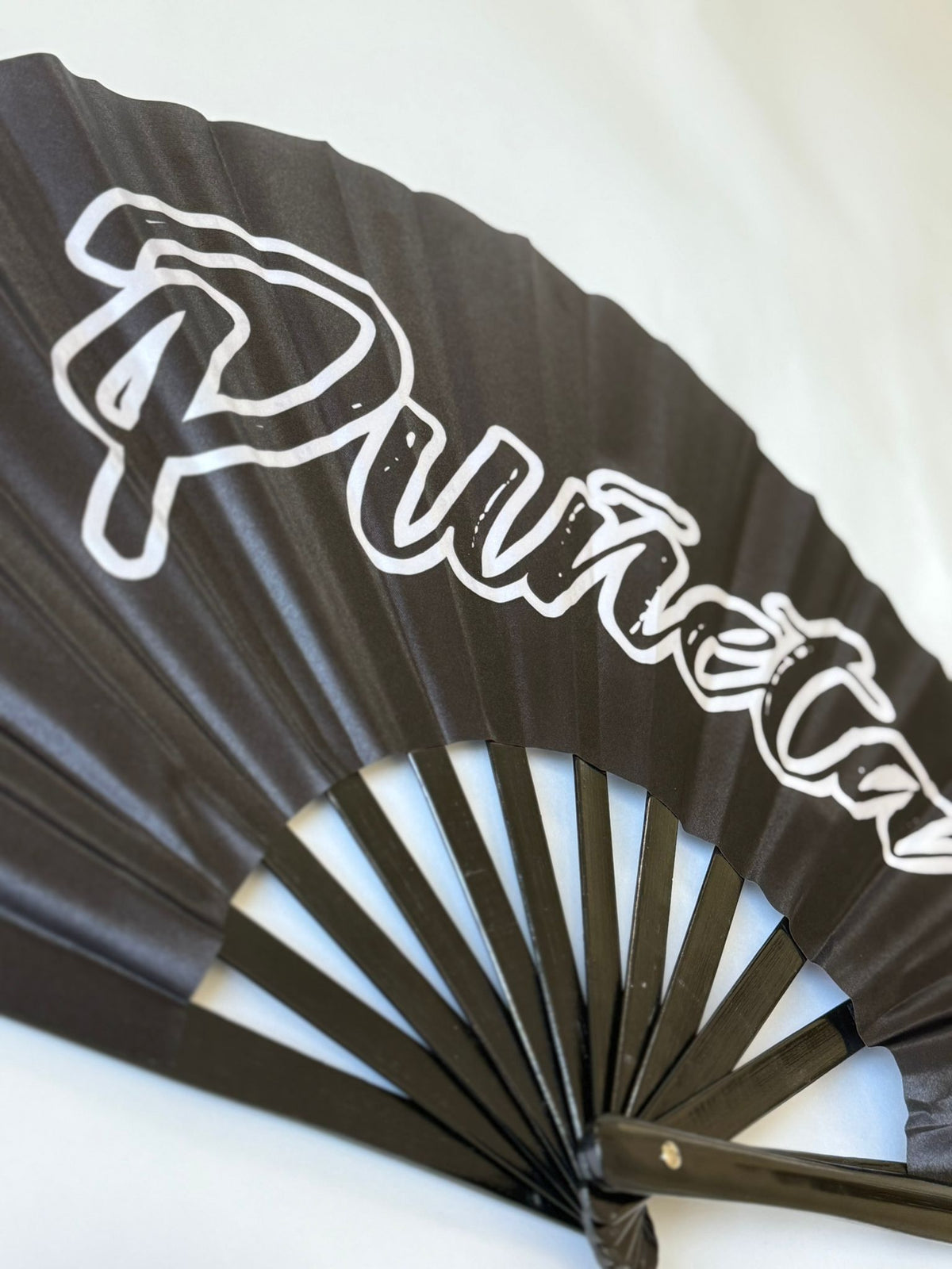 Large black bamboo folding fan with Puñeta design for festivals and parties