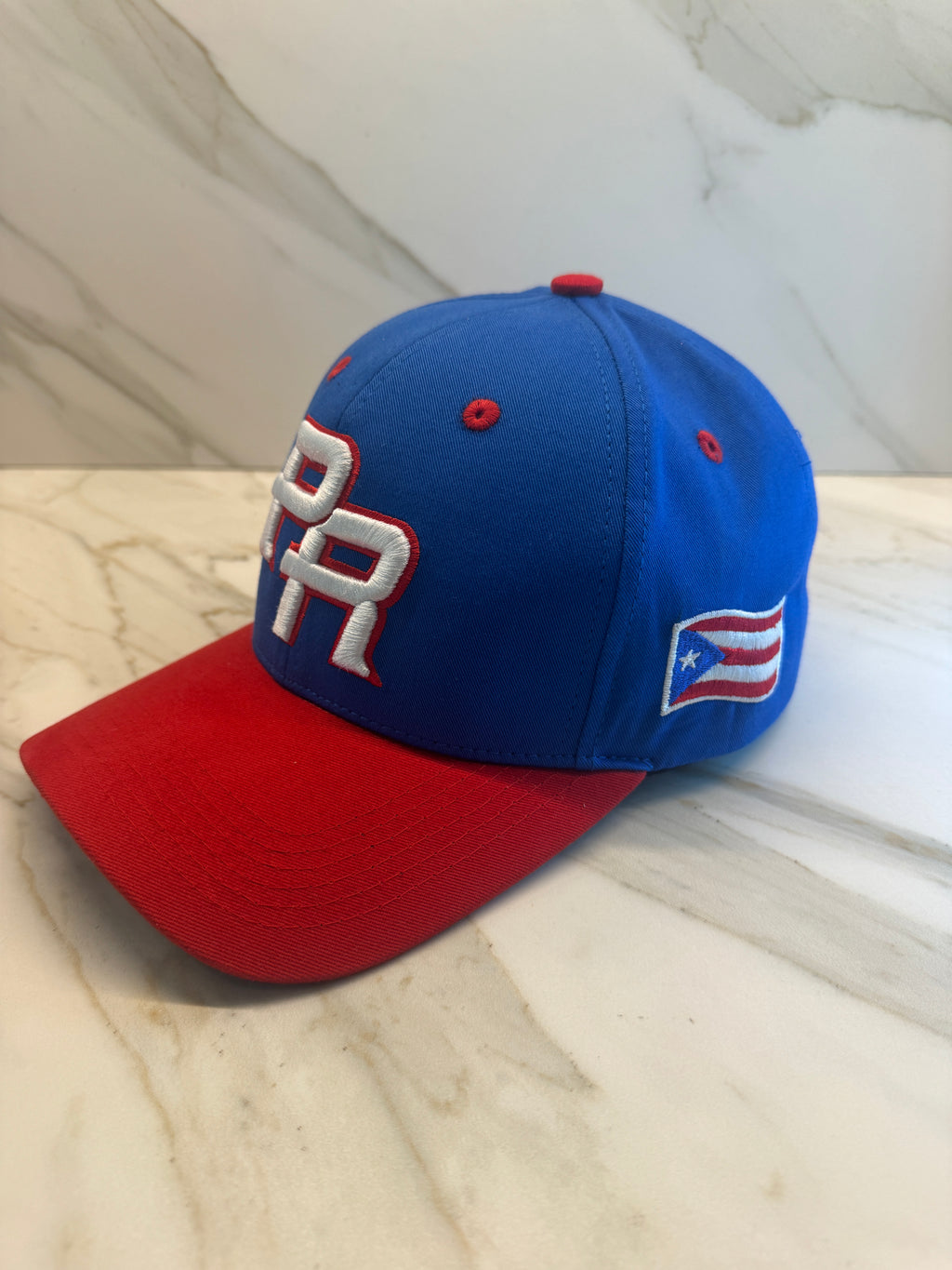 Streetwear inspired curved brim cap with Puerto Rico embroidery and soft fabric finis