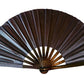 Solid black folding fan with black bamboo ribs
