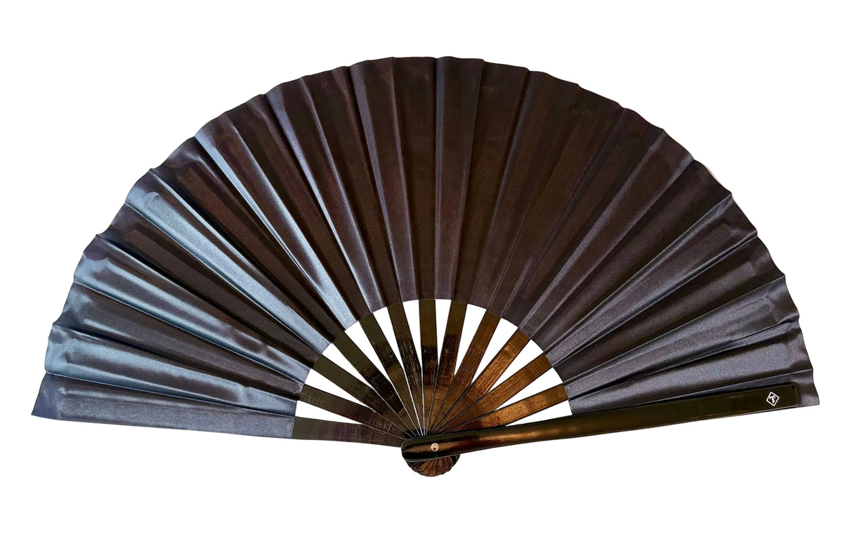 Solid black folding fan with black bamboo ribs