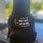 Multi-flag crossbody chest pack with water-resistant fabric