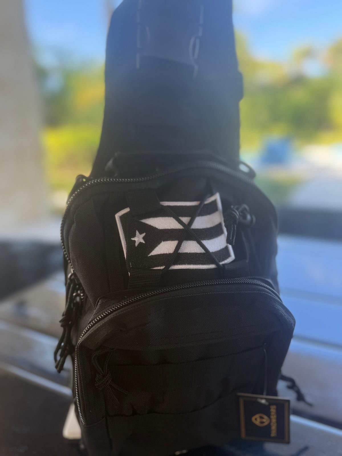 Multi-flag crossbody chest pack with water-resistant fabric